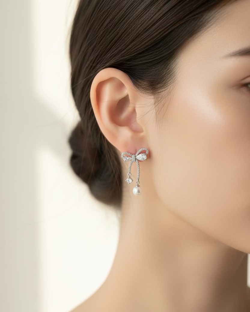 Bow-shaped dangle earrings #02656
