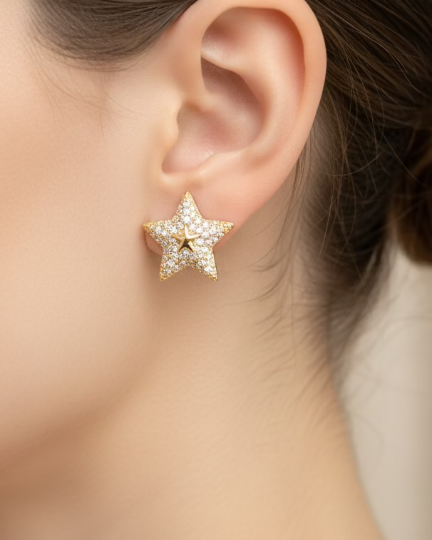 Diamante star huggies in Gold #04330